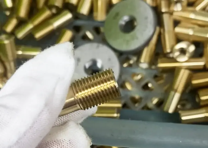 Custom precision CNC turned brass shoulder stud copper machining external thread geometry details held strictly to drawing requirements by FIWOK METALWORKS