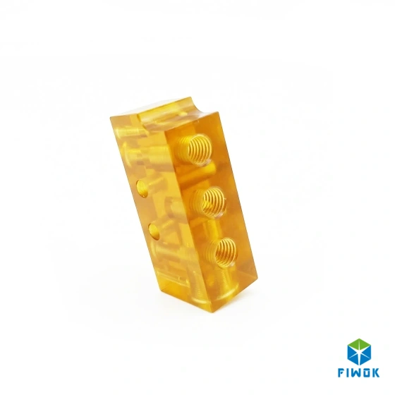 Custom CNC Milled Amber PEI Manifold with Internal Threads